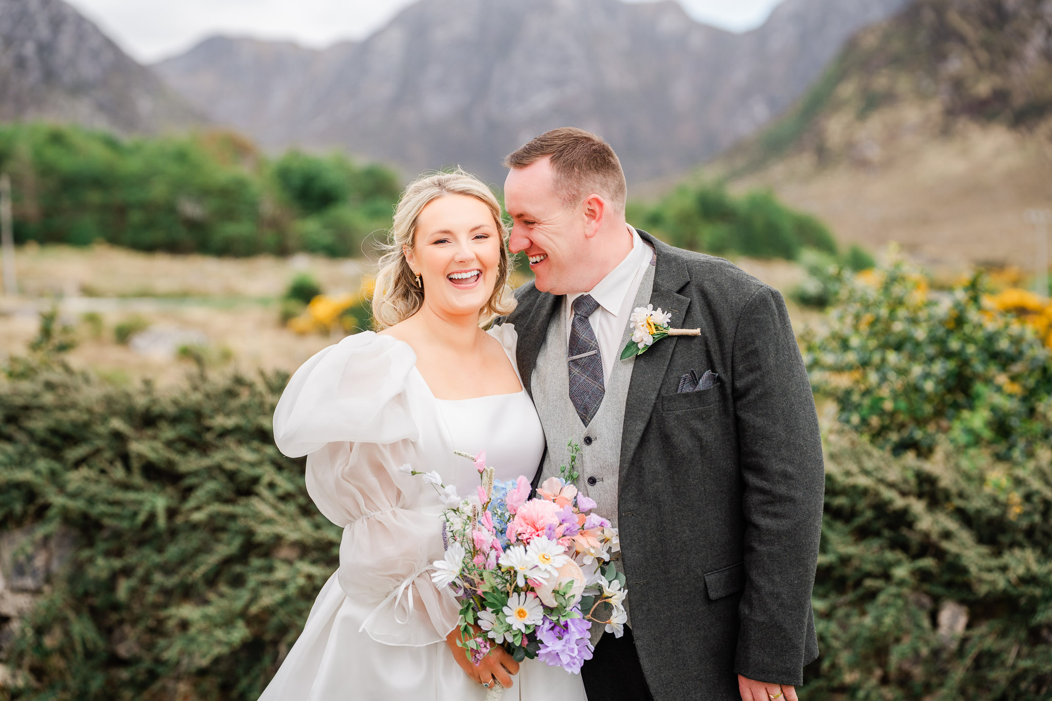 A bride and groom sharing a funny moment at their wedding in Dunlewey Co.Donegal